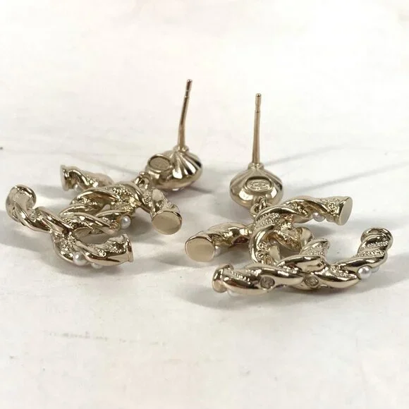 CHANEL Pink Pearl Logo Earrings